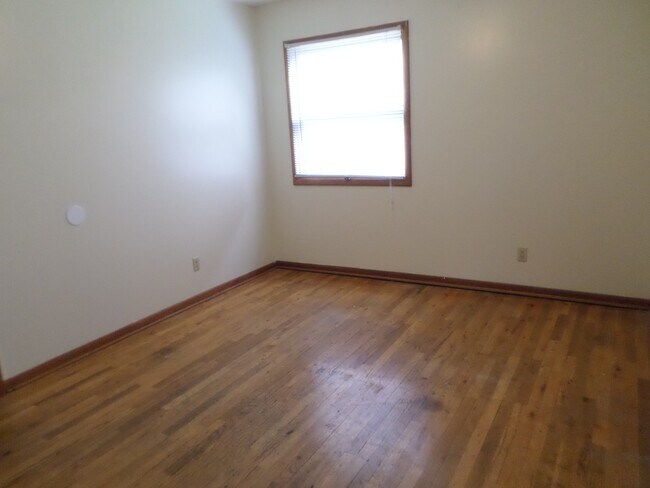Building Photo - Privacy Fence and a Garage!