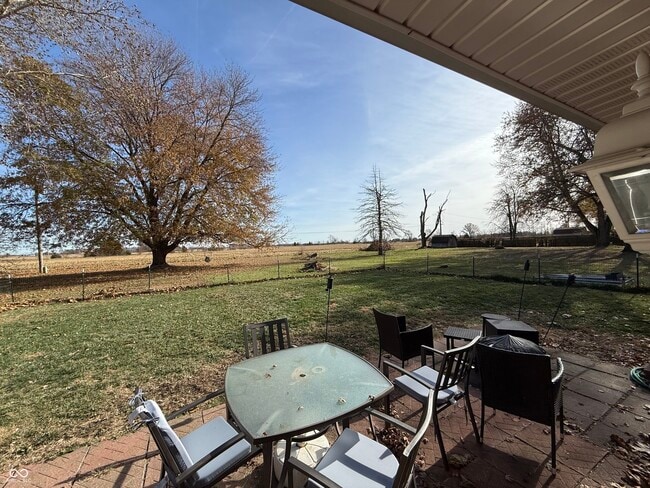 Building Photo - 8667 N Ricks Dr E