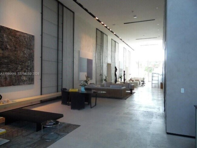 Building Photo - 10203 Collins Ave