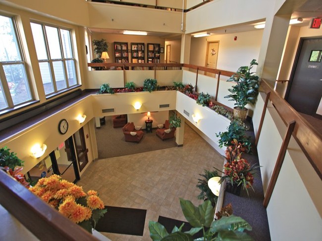 Relax and socialize in our community room - Woodland Hills - A Senior Community