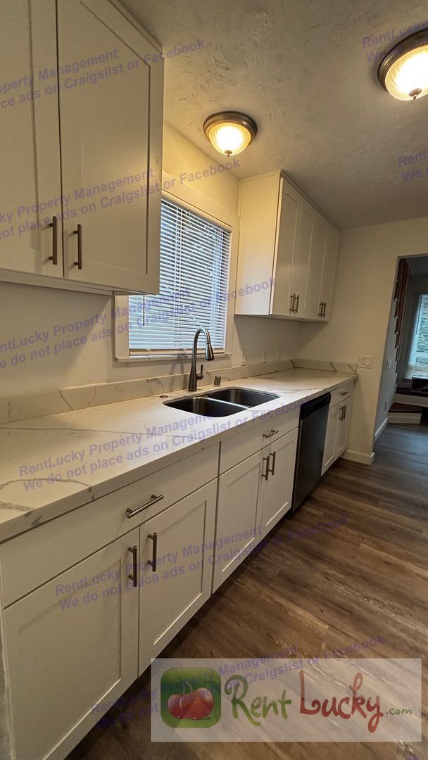 Building Photo - Free December Rent! Upper Unit 2BR/2BA Home in Maple Leaf – Amazing Finished Attic + Driveway Par...