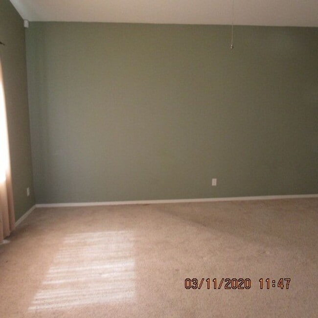 Building Photo - 3 bedroom 2 bath home with 3 car garage and RV parking