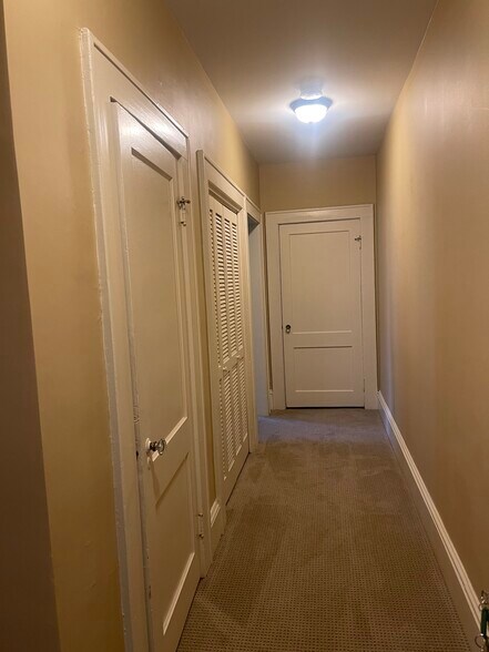hallway hides new washer/dryer - 418 Clement Ave