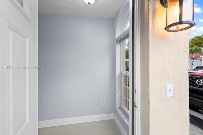 Building Photo - 6910 NW 166th Terrace
