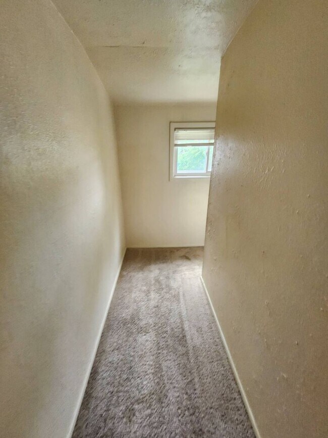 Building Photo - Move-In Special: Save $300 on This Charmin...