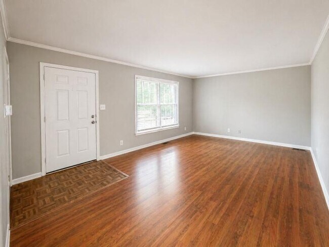 Building Photo - Welcome home to the perfect blend of peaceful country charm and modern city living!