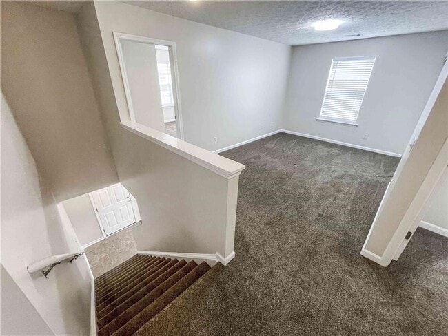 Building Photo - 6205 Tree Ridge Dr N W