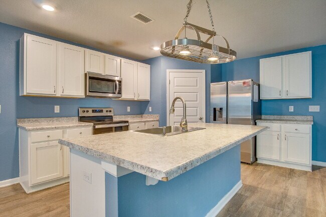 Building Photo - Season’s Savings! Spacious 5BR Near NAS – Military Half Deposit & $500 Off First Month!