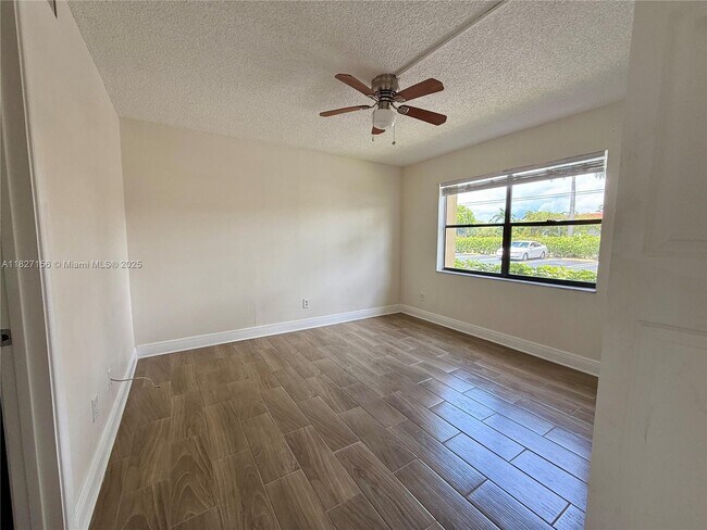 Building Photo - 11130 Royal Palm Blvd