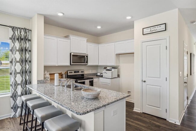 Building Photo - End unit! Available Early June!