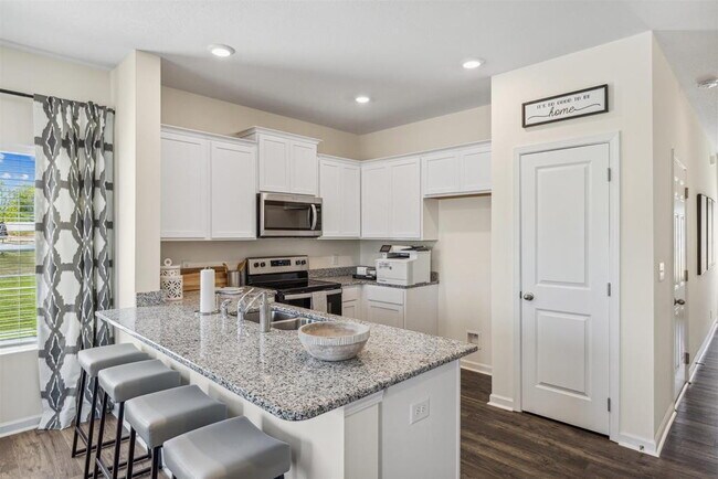 Building Photo - End unit! Available soon!