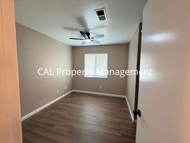 Building Photo - Spacious 4-Bedroom Home with 2-Car Garage & Backyard Oasis