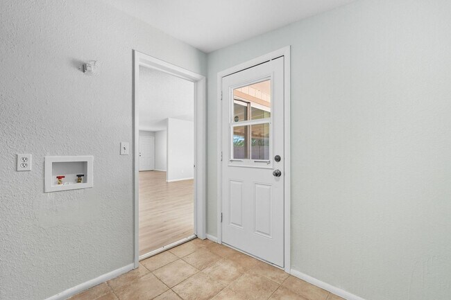 Building Photo - Three bedrooms plus big garage!