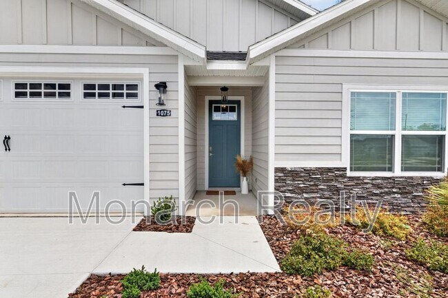 Building Photo - 1075 SW 66th Ter