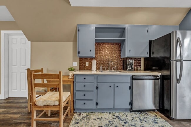 Building Photo - Furnished 1-Bedroom Upper Apartment on Main St