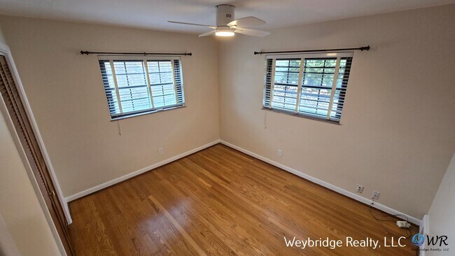 Building Photo - Charming Mid-Century 2BR Home with Sunroom, Fireplace & Fenced Yard