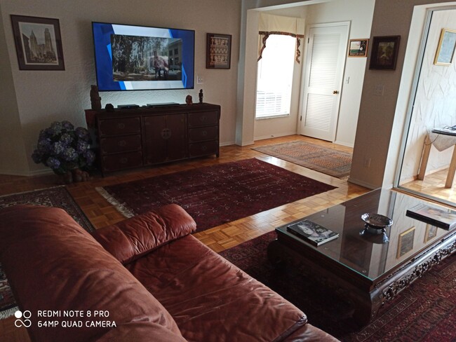 Spacious living room, harwood floor with Persian crapets - 106 Siena Way