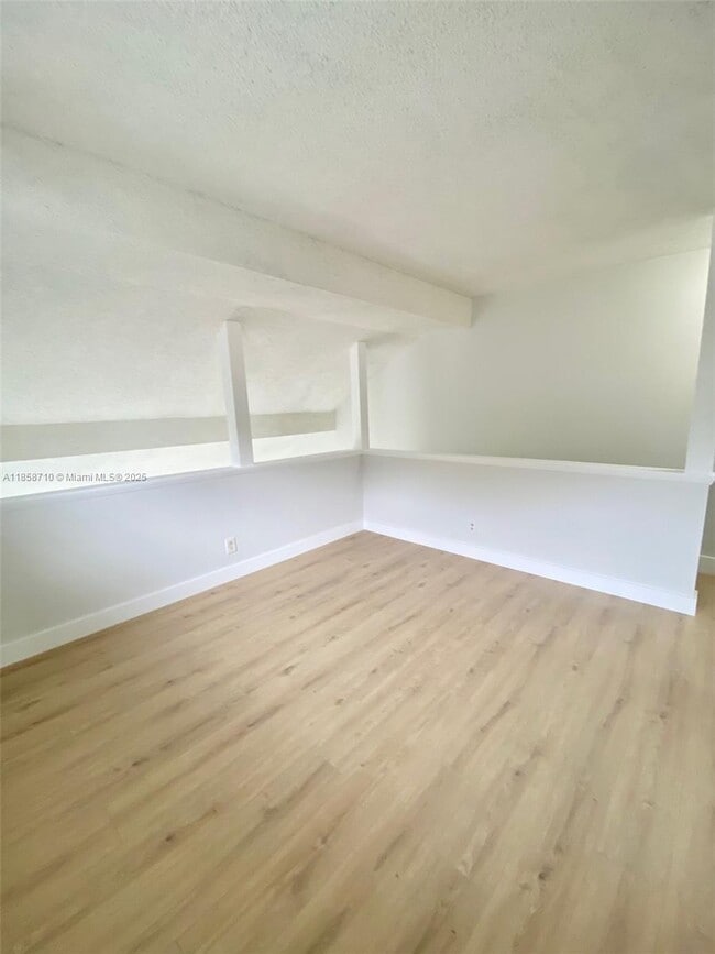 Building Photo - 3200 Coral Springs Dr