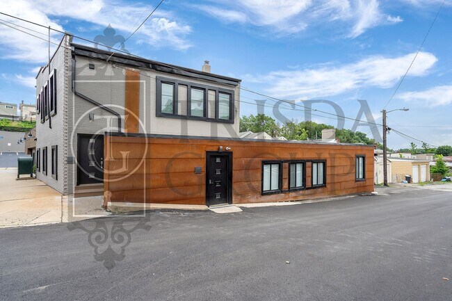 Building Photo - Modern 1 BR Apt in Mt Washington, 2 Off Street Parking Spaces, Private storage, Pets OK, W/D, DW, AC