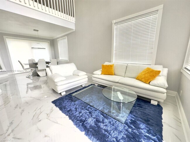 Building Photo - 3 br, 2.5 bath House - 8910 NW 45th Ct # 0