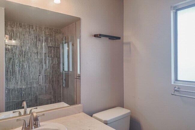 Building Photo - Modern Comfort with Pool & Spa in The Lakes – Solar Equipped Home