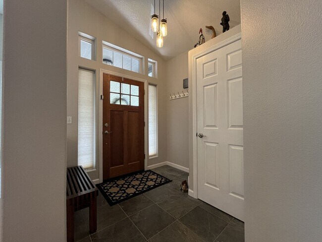 Building Photo - Spacious 3-Bedroom Home with Two Living Areas, Private Balcony, Fireplace & Attached 2-Car Garage