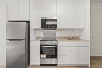 Building Photo - Brand New Studio at The Flats at Sky Ala M...