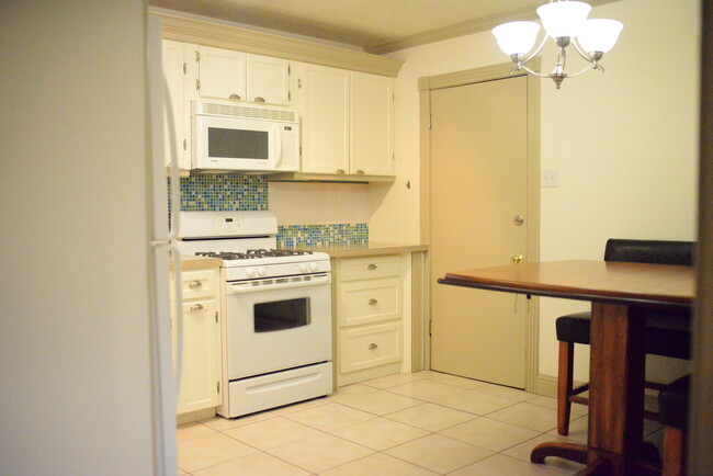 kitchen with garage access. - 307 El Toro St