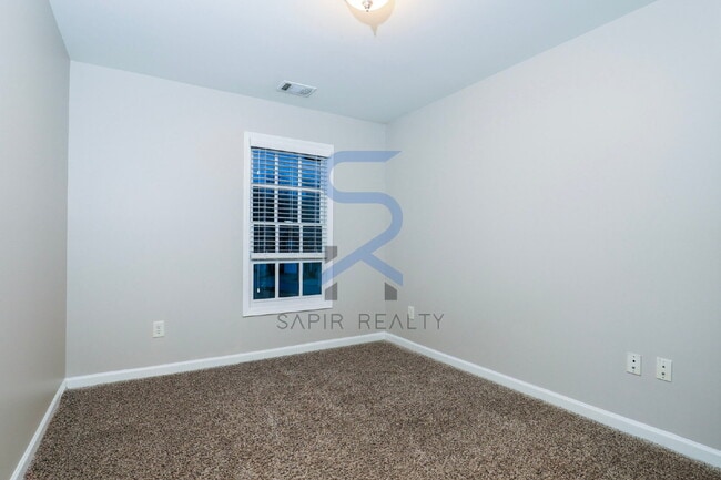 Building Photo - Move in before January 31st and choose your reward: a $250 Amazon Gift Card or a 55" Smart TV!