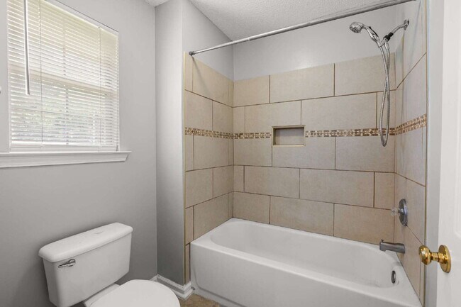 Building Photo - Charming All-Brick Home with Garage & Covered Patio!