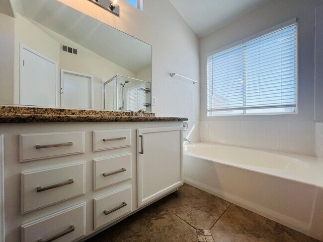 Building Photo - REMODELED, SPACIOUS, 4 BEDROOM HOME WITH VAULTED CEILINGS AND LOFT