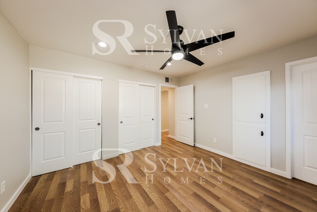 Building Photo - This lovely home is ready for your personal touch!