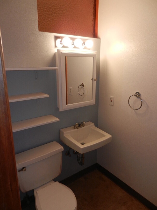 Building Photo - Well-Located Home with Fireplace, Fenced Yard & 2-Car Garage