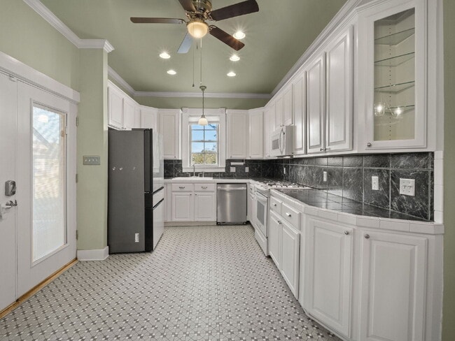 Building Photo - Enchanting 4-bedroom, 3-bathroom Extended ...