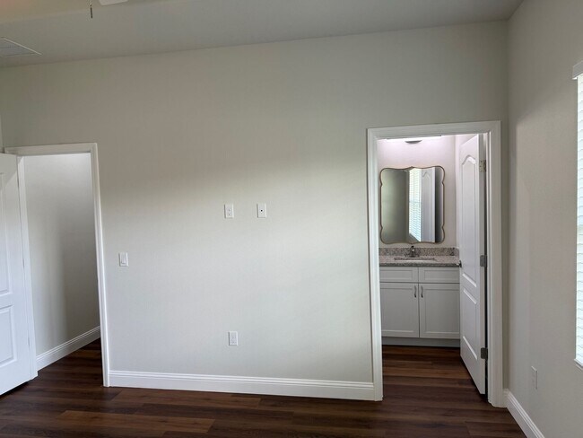 Building Photo - Brand new 3/2/1 with screed in porch and fenced yard! 2 units available