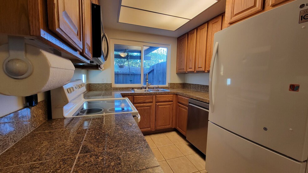 There is a built in reverse osmosis water filtration system. The fridge has ice maker. - 9505 Easter Way