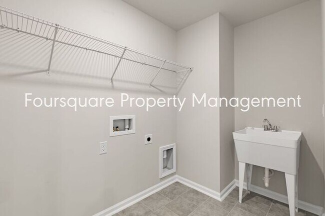 Building Photo - Coming Soon; July 27, 2026 : End unit ToSpacious End-Unit Townhome with 2nd Floor Loft, Screened-...
