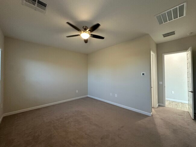 Building Photo - 10319 W Harmony Ln