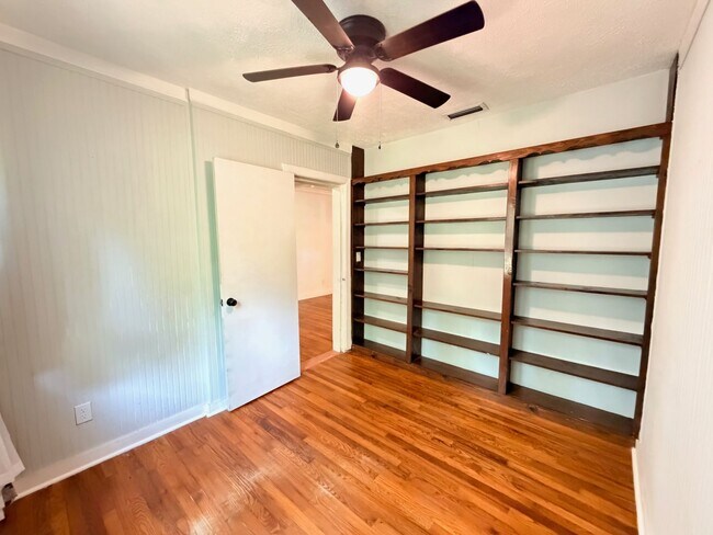 Building Photo - Historic Downtown Charm | Original Floors | Walk to Golf, Dining, Parks, & Concerts