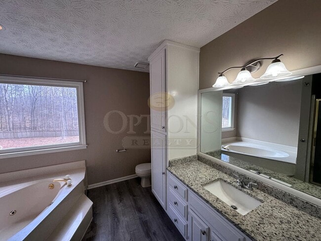 Building Photo - 4BR/3BA on Large Private Wooded Lot- Woodstock