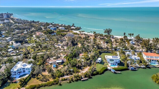 Building Photo - ALL THE CHARM! - Siesta Key 1+ acre on the Bay - 3 bed/ 2 bath pool home