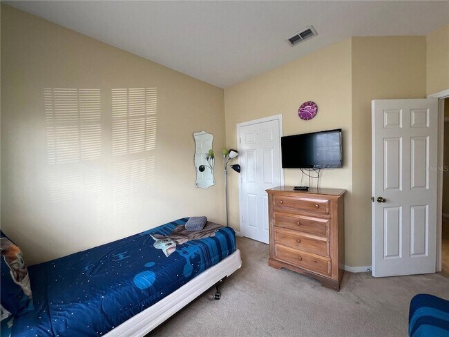 Building Photo - 8127 Fan Palm Way