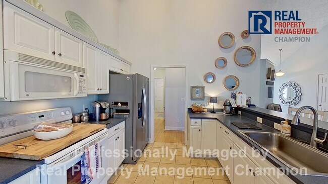 Building Photo - Immaculate Home Featuring Open Floorplan, ...