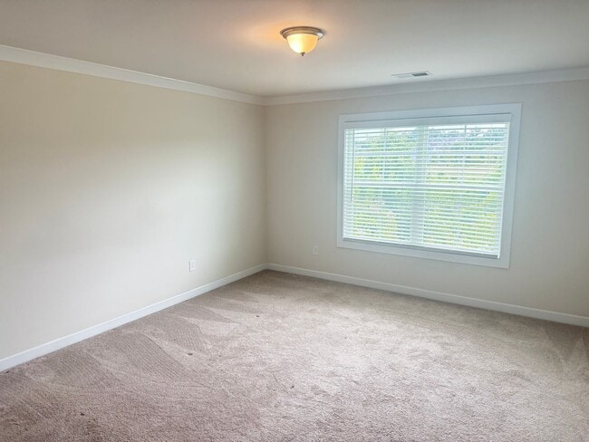 Building Photo - Beautiful Westbranch Home with 2-Car Garage, Covered Porch & Greenway Entrance Across the Street