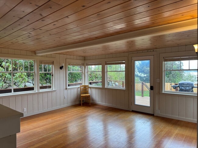 Building Photo - Desirable Indianola waterfront just in time for summer
