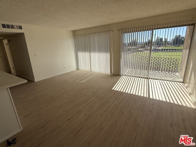 Building Photo - 10200 De Soto Ave