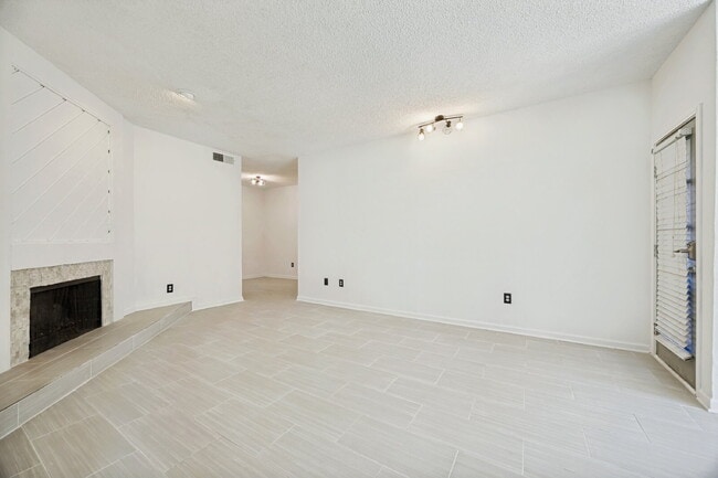 Building Photo - Spacious Dallas Condo with Unbeatable Storage, Private Patio & Carport
