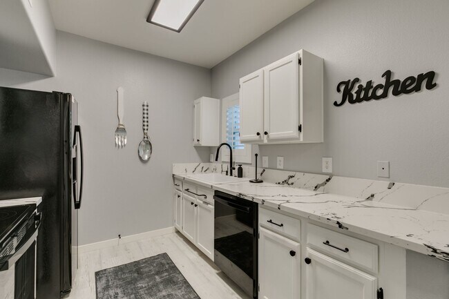 Building Photo - Stylish Fully Furnished 1BR Condo with Private Patio & Custom Closet