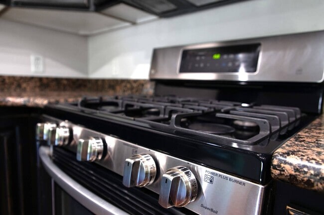 Building Photo - Unfurnished Condo Retreat with Modern Comf...