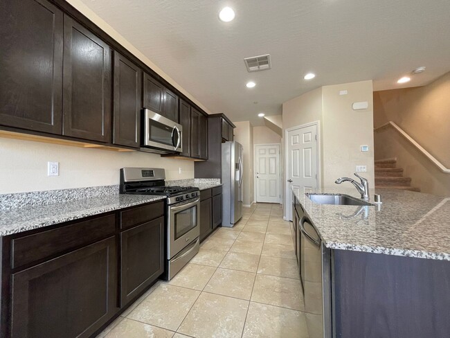 Building Photo - 4 BED 2.5 BATH 2 CAR GARAGE SINGLE FAMILY ...